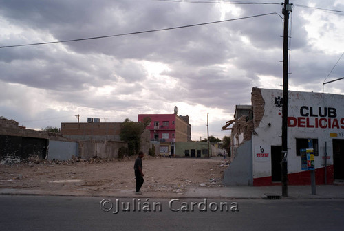 Man Walking in Front of Empty Lot, Juárez, 2007