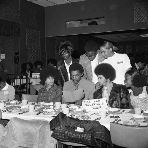 Black Business Association luncheon participants posing together, Los Angeles, 1973