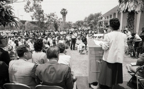 California African American Museum Director Aurelia Brooks addressing a crowd, Los Angeles, 1983