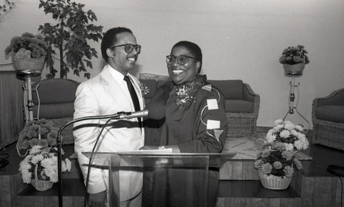 Chapel of King Church pastor and his wife during an event, Los Angeles, 1987