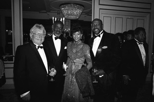 Lou Gossett, Jr., Cindi Gossett, and Al Nellum posing together at the Black Emmy nominees dinner, Los Angeles, 1989