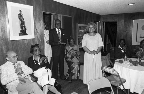 Jessie Mae Beavers speaking at an event in a private residence, Los Angeles, 1984