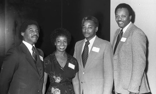 Mike Anderson and others posing for a group portrait, Los Angeles, 1981