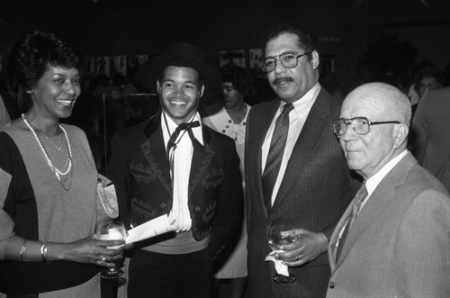 Julian Dixon, Augustus Hawkins and others posing together, Los Angeles, 1984