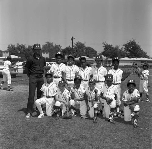 Core Lee Park boy's baseball team members posing together, Los Angeles