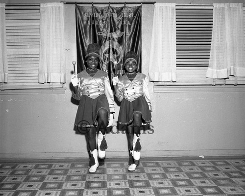 Two girls marching, Los Angeles, 1960