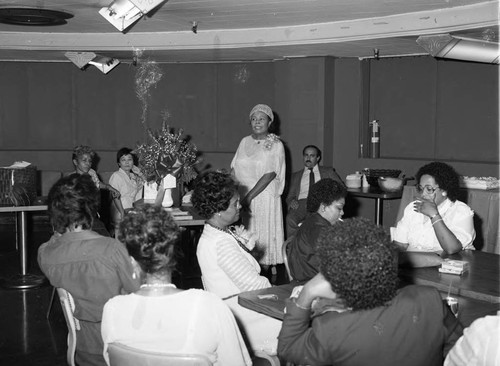 Zephra Dunn speaking to guests during a reception celebrating her retirement, Los Angeles, 1983