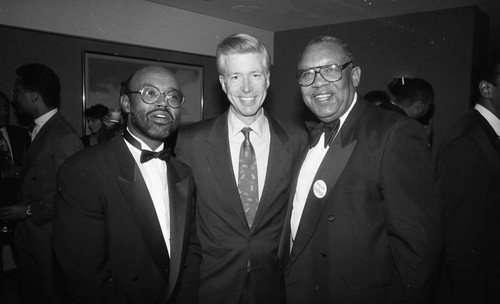 Gray Davis posing with Brad Pye, Jr. at an event coordinated by Fleishman & Hillard, Los Angeles, 1993