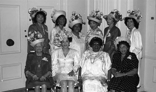 Mad Hatters Luncheon attendees posing together, Los Angeles, 1989