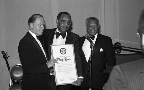 Philip M. Hawley receiving an award at the Urban League's Whitney M. Young, Jr. Awards Dinner, Los Angeles, 1988