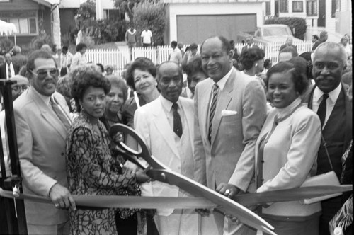 Tom Bradley and others cutting a ribbon at the Delta Sigma Theta Senior Center, Los Angeles, 1987