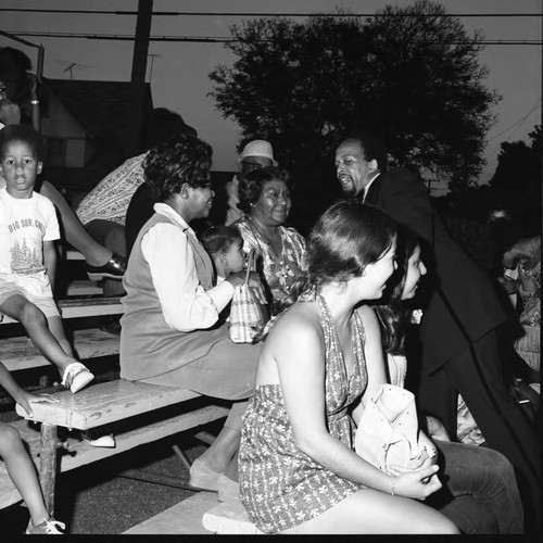 Entertainer walking among his audience, Los Angeles, 1971