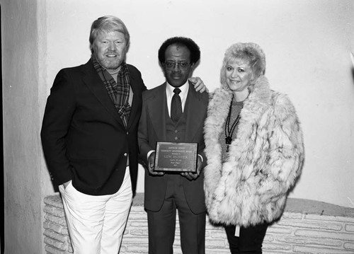 Lew Hunter posing with Pamela Hunter at the Pied Piper Club, Los Angeles, 1987