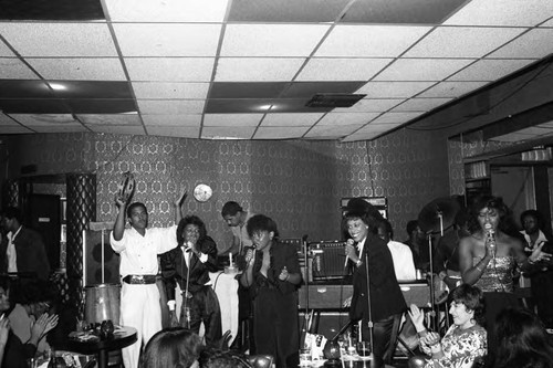 Members of the group SHE performing at the Pied Piper club, Los Angeles, 1983