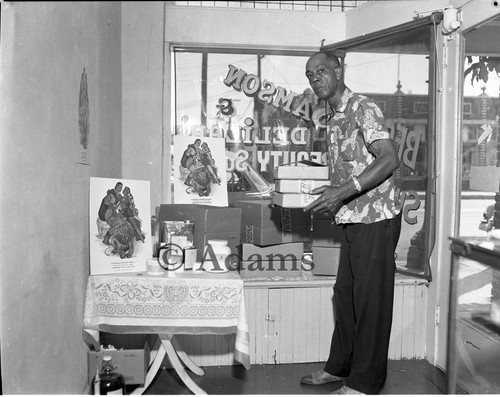 Man at store window, Los Angeles, 1955