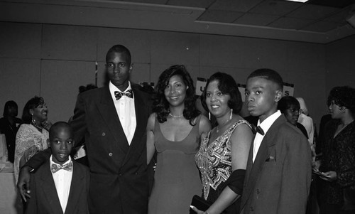 Earlitha Kelly posing with others during the "A Midsummer's Night Magic" event, Beverly Hills, 1994