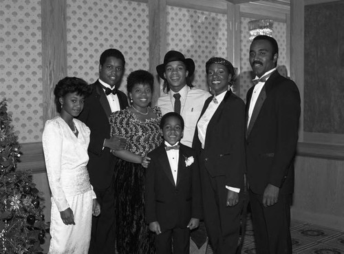 Gene Anthony Ray, Todd Davis, Jaleel White and others posing together at a First AME banquet, Los Angeles, 1985