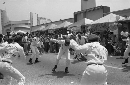 Gladiators group participating in a street festival, Los Angeles, 1983