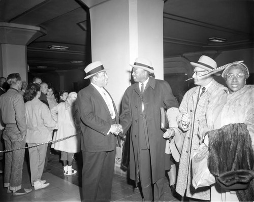 Rev. Clayton D. Russell Sr. greeting Rev. Clarence Cobb at Union Station, Los Angeles, 1957