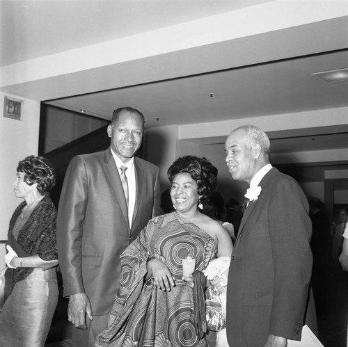 Tom Bradley posing with Roy Wilkins at a testimonial dinner, Los Angeles, 1969