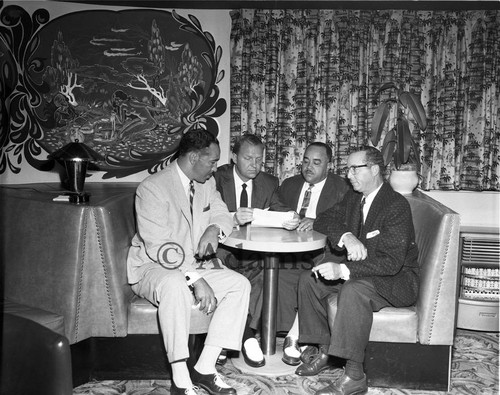 Four men at a table, Los Angeles, 1956