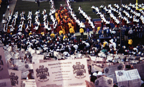 Spectators participating in a synchronized card display at Super Bowl XXVII, Pasadena, 1993