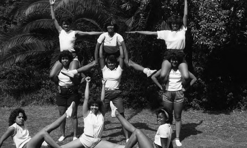 Phi Beta Sigma Interfraternity Basketball cheerleaders posing in formation, Los Angeles, 1984