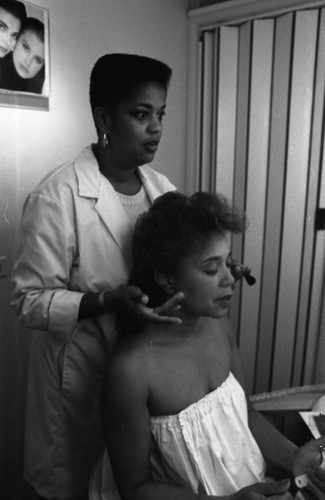 Staff at The Body Clinic apply makeup to a client, Los Angeles, 1986