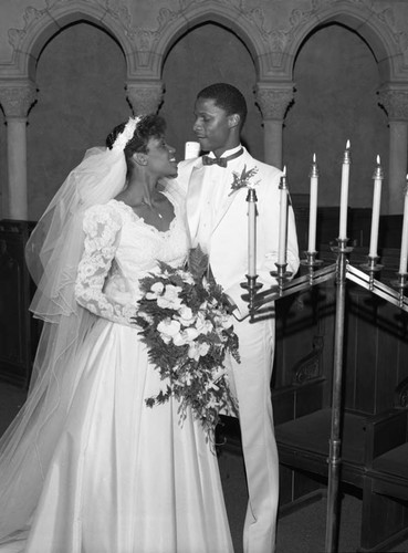 Darryl Strawberry and Lisa Andrews posing at their wedding, Pasadena, 1985