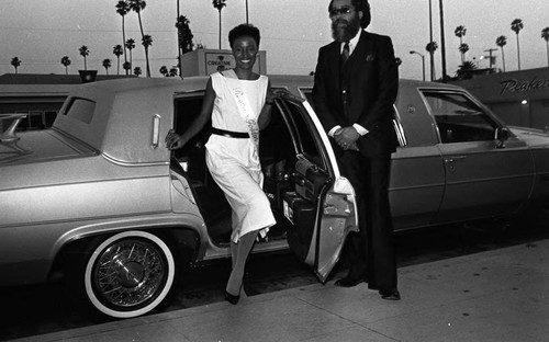 Woman arriving at the Reunite press conference, Los Angeles, 1984