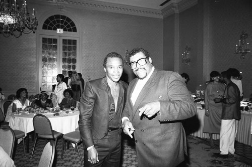 Sugar Ray Leonard posing with George Duke at Magic Johnson's birthday party, Los Angeles, 1985