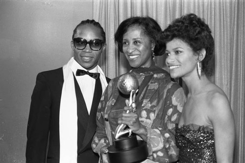 Marla Gibbs, Gene Anthony Ray, and Debbie Allen posing together at the NAACP Image Awards, Los Angeles, 1981