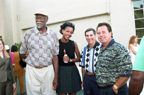 Bill Russell posing with others at the Jackie Robinson Foundation Invitational Golf Classic, Los Angeles, 1994