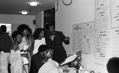 Jim Brown coordinating tasks during the NAACP Image Awards, Los Angeles, 1978