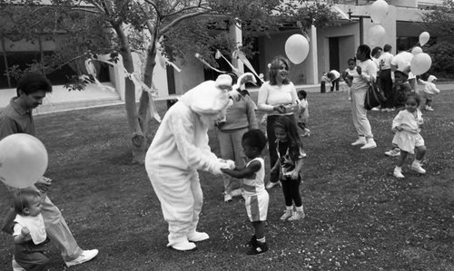 Easter Bunny greeting a child, Los Angeles, 1987