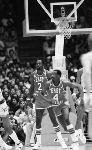 Moses Malone and Sidney Montcrief playing their positions during the NBA All-Star Classic, Inglewood, 1983