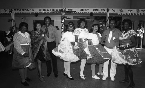 Van Meter Squares dancing group members posing together, Los Angeles, 1989