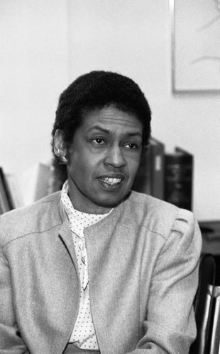 Eleanor Holmes Norton sitting in an office of the ACLU, Los Angeles, 1984