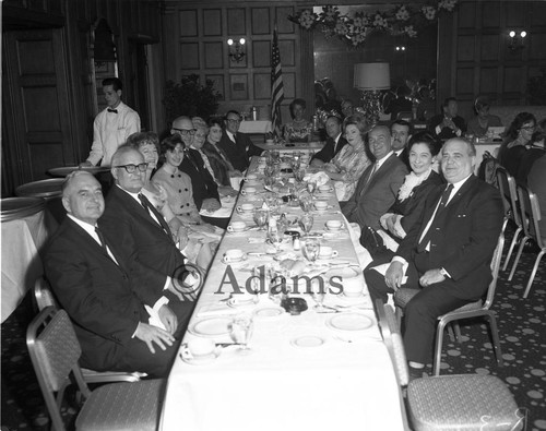 Men and women at banquet table, Los Angeles, 1964