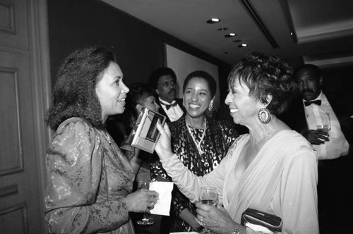 Black Emmys attendee Denise Nicholas talking with Gertrude Gipson, Los Angeles, 1987