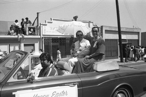 David Cunningham Jr. and family riding in the 16th Annual Easter parade, South Central Los Angeles, 1984