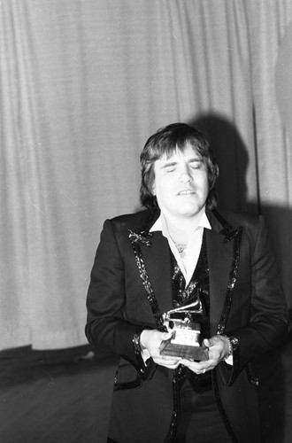 José Feliciano posing with his Grammy at the 26th Annual Grammy Awards, Los Angeles, 1984