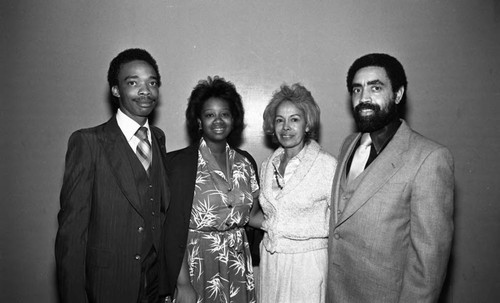 Virgil W. Hill, Jr., posing with Crenshaw Family YMCA Current Support Campaign participants, Los Angeles, 1983