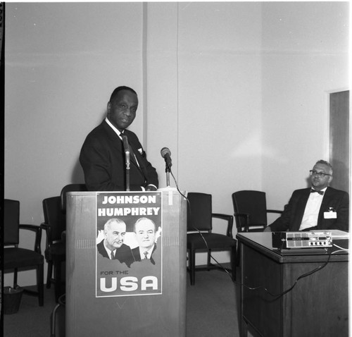 Man at podium, Los Angeles, 1967