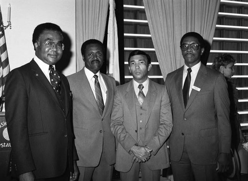 Elected officers of the Association of Black Law Enforcement Executives posing tougher, Los Angeles, 1983