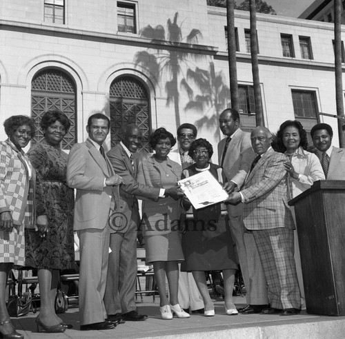 Bradley and Lindsay make presentation, Los Angeles, 1977