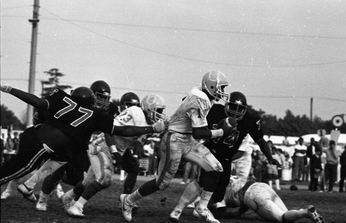 Players on the field during the Carson vs. Banning football game, Los Angeles, 1982