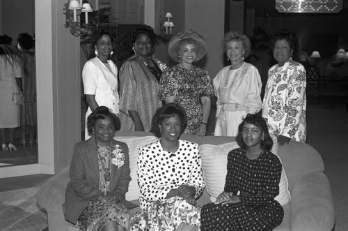 Alpha Kappa Alpha sorority sisters posing together at a luncheon, Los Angeles, 1989