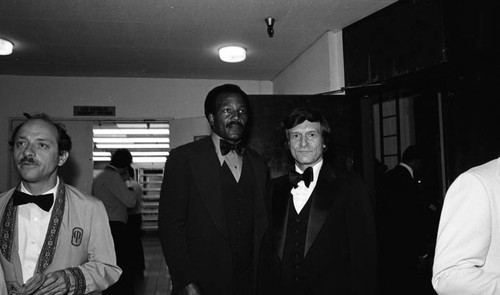 Jim Brown talking with Hugh Hefner during the NAACP Image Awards, Los Angeles, 1978