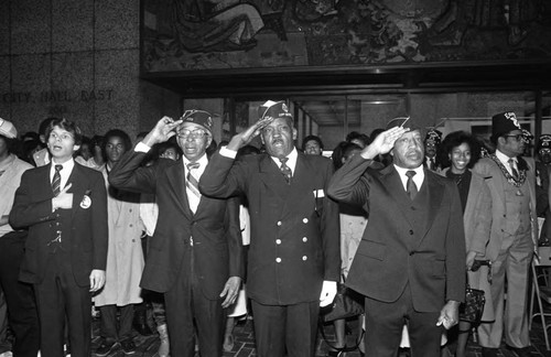 Veterans salute during a Black History Month ceremony, Los Angeles, 1982